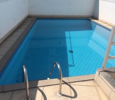 Triangulo das Bermudas Apartment | Discover Apart Quartier Latin Hotel: Family-Friendly Retreat