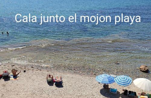 Los Puertos Apartment | Tranquil Seaside Retreat with Large Terraces and Family-Friendly Amenities