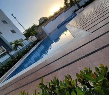 Gregorio Luperon Apartment | Cozy Central Apartment with Inviting Pool Access