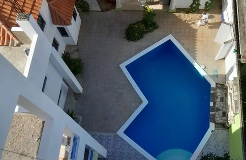 Ensanche Isabelita Apartment | Comfortable Stay at Aparta Hotel Doña Ana 1-A for Families