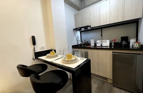 Campin Apartment | Modern Aparta Suite Movistar Arena with Terrace & BBQ