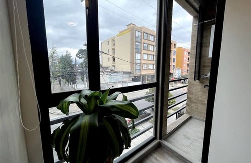Campin Apartment | Modern Aparta Suite Movistar Arena with Terrace & BBQ