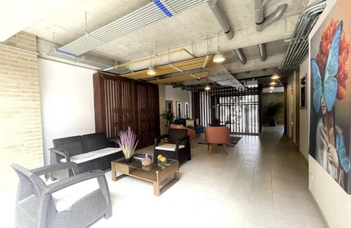 Campin Apartment | Modern Aparta Suite Movistar Arena with Terrace & BBQ