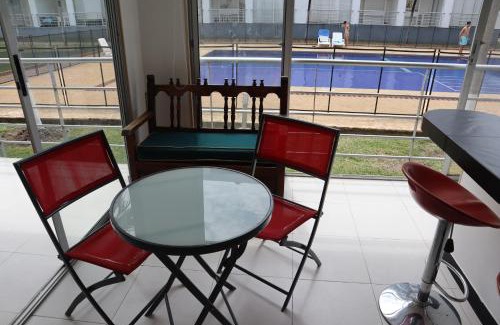 Flandes Apartment | Cozy Studio with Poolside Balcony & Ocean Views