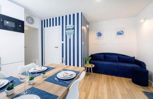 Poddabie Apartment | Experience Blue Marine Poddąbie: Pool, Oceanfront & Kids' Fun