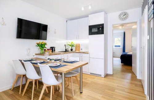 Poddabie Apartment | Experience Blue Marine Poddąbie: Pool, Oceanfront & Kids' Fun