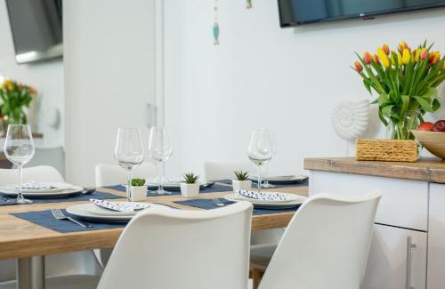 Poddabie Apartment | Oceanfront Retreat: 4-Star Blue Marine Poddąbie Apartment