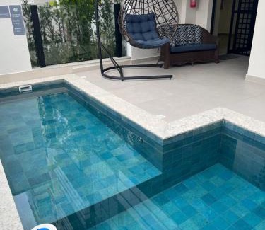 Governador Celso Ramos Apartment | Relax in a Poolside Apartment Steps from the Beach