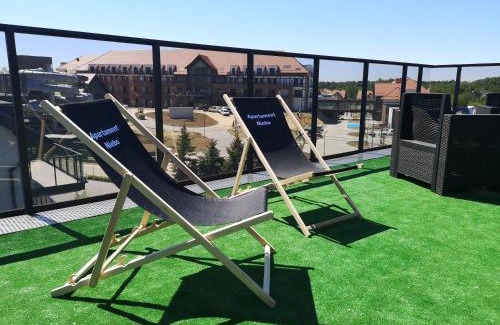 Ostroda Apartment | Oceanfront Escape: Apartament Niebo by the Beach
