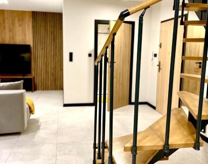 Ostroda Apartment | Oceanfront Escape: Apartament Niebo by the Beach