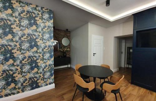 Zamosc Apartment | Discover Apartament Ratuszowy: 4-Star Family Retreat