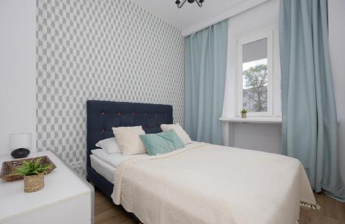 Zoliborz Apartment | Cozy One-Bedroom Apartment with Balcony Near Metro