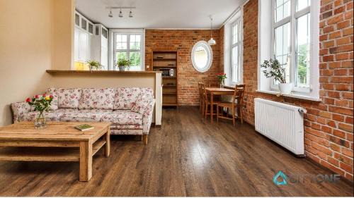 Oliwa Apartment | Discover the Delightful Apartment with Veranda at Dworek Oliwski