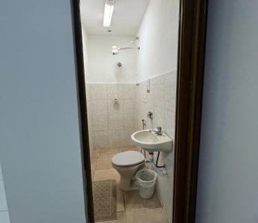 Patos de Minas Apartment | Apartamento 108 - Suíte com ar condicionado