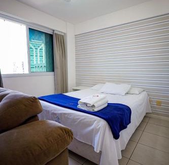 Caminho das Arvores Apartment | Convenient Apartment Near Salvador Shopping with Pool