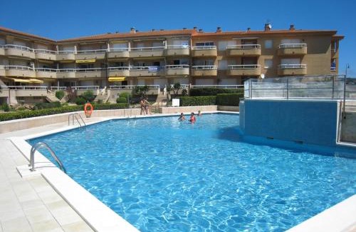 Els Griells Apartment | Idyllic Beachside Apartment with Pool in L'Estartit