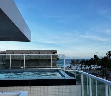 Sao Domingos Apartment | Cozy Beachfront Apartment with Pool and Family Amenities