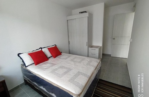 Girardot Apartment | Top-Rated Aqualina Apartment with Pool View & Pet-Friendly