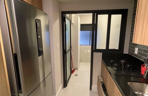 Asturias Apartment | Beachfront Apartment at Praia do Tombo with Spa Amenities