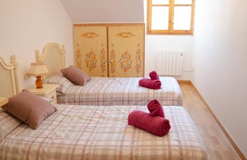 Rialp Apartment | Central Apartment with Parking - Family Friendly Stay