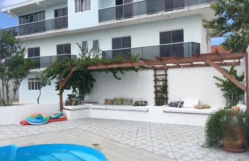 Ingleses do Rio Vermelho Apartment | Poolside Retreat Steps from the Beach - Guest Rated 10/10