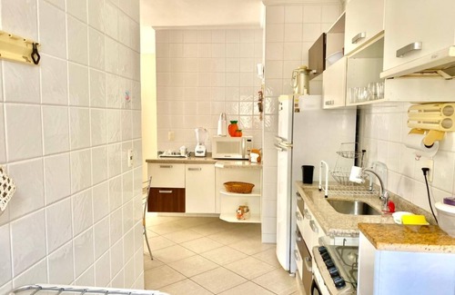 Praia Grande Apartment | Relaxing Apartment with Pool & Grill Near Praia Gde