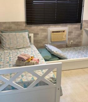 Gonzaga House | Discover an Oceanfront Shared Apartment in Gonzaga, Santos