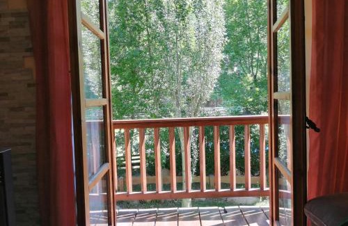 Taull Apartment | Family-Friendly Isard 1 Apartment with Garden Oasis