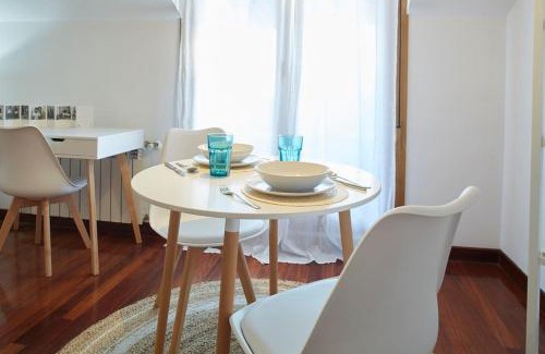 Las Mestas Apartment | Cozy Apartment with Terrace Steps from the Beach