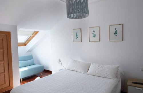 Las Mestas Apartment | Cozy Apartment with Terrace Steps from the Beach