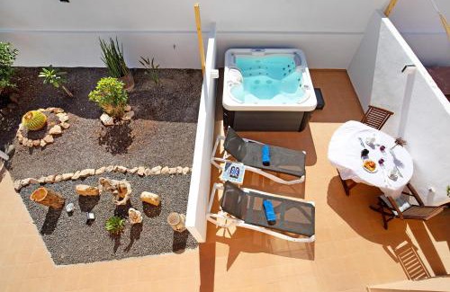 Tarajalejo Apartment | Relaxing El Naranjo Apartment with Hot Tub, Rated 10/10