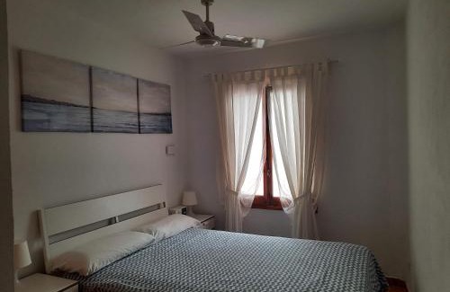 Arenal d'en Castell Apartment | Beachside Apartment in Arenal with Pool and Ocean Views
