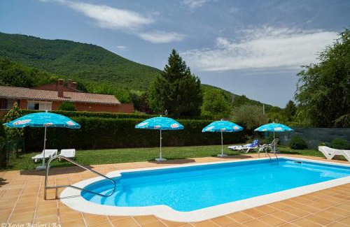 Sant Feliu de Pallerols Apartment | Cozy Apartamentos Fonda Finet: Pet-Friendly with Pool