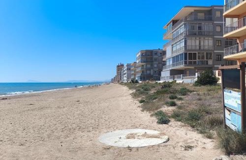 Tavernes de la Valldigna Apartment | Beachfront Apartment: Family & Pet-Friendly Retreat