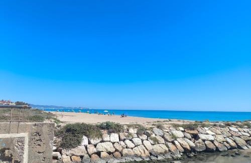Tavernes de la Valldigna Apartment | Beachfront Apartment: Family & Pet-Friendly Retreat