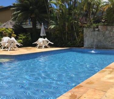 Saco da Ribeira Apartment | Charming Chalet-Style Apartment with Pool & Ocean Views