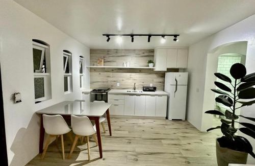 Saco da Ribeira Apartment | Charming Chalet-Style Apartment with Pool & Ocean Views