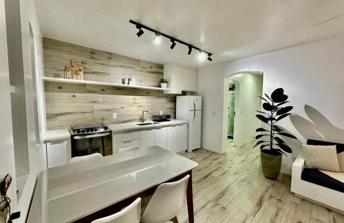 Saco da Ribeira Apartment | Charming Chalet-Style Apartment with Pool & Ocean Views