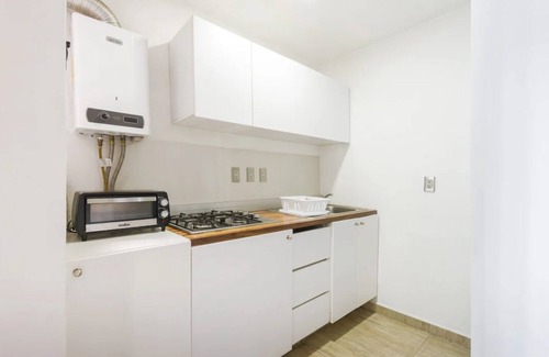 Santa Maria la Ribera Apartment | Explore Juárez Apartment: Family-Friendly in Roma Norte