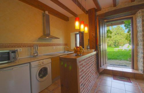Suances Apartment | Beautiful La Ermita Apartment with Oceanfront Garden Views
