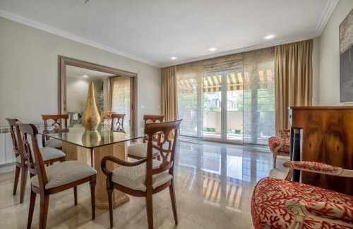 Distrito Norte Sierra Apartment | Elegant Apartamento Los Tilos with Pool & Parking