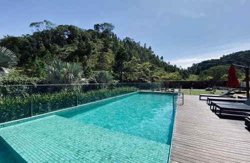 Itajai Apartment | Experience The Green Hill with Pools in Praia Brava