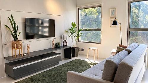Itajai Apartment | Experience The Green Hill with Pools in Praia Brava