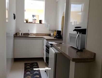 Regiao Urbana Homogenea V Apartment | Central Apartment in Poços: Pet-Friendly & Highly Rated