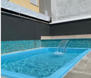 Centro Apartment | Experience Ubatuba: Central Apartment with Ocean View & Charcoal Grill