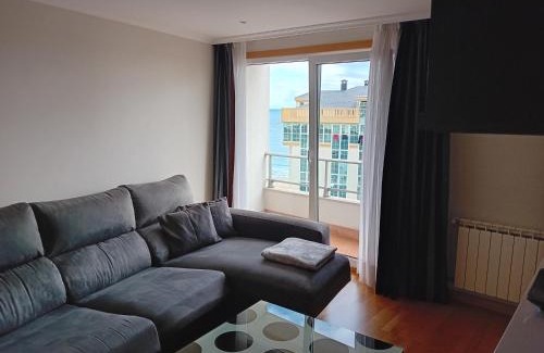 Burela Apartment | Oceanfront Apartment Playa: Pet Friendly & Family Ready