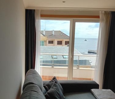 Burela Apartment | Oceanfront Apartment Playa: Pet Friendly & Family Ready