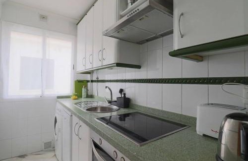 El Rompido Apartment | Inviting Getaway at Apartamento Toledo 8 with Pool Access