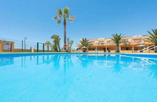 Tarifa Apartment | Oceanfront Apartment Urb La Tortuga I with Private Pool