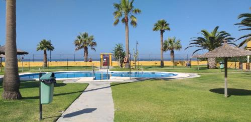 Tarifa Apartment | Oceanfront Apartment Urb La Tortuga I with Private Pool